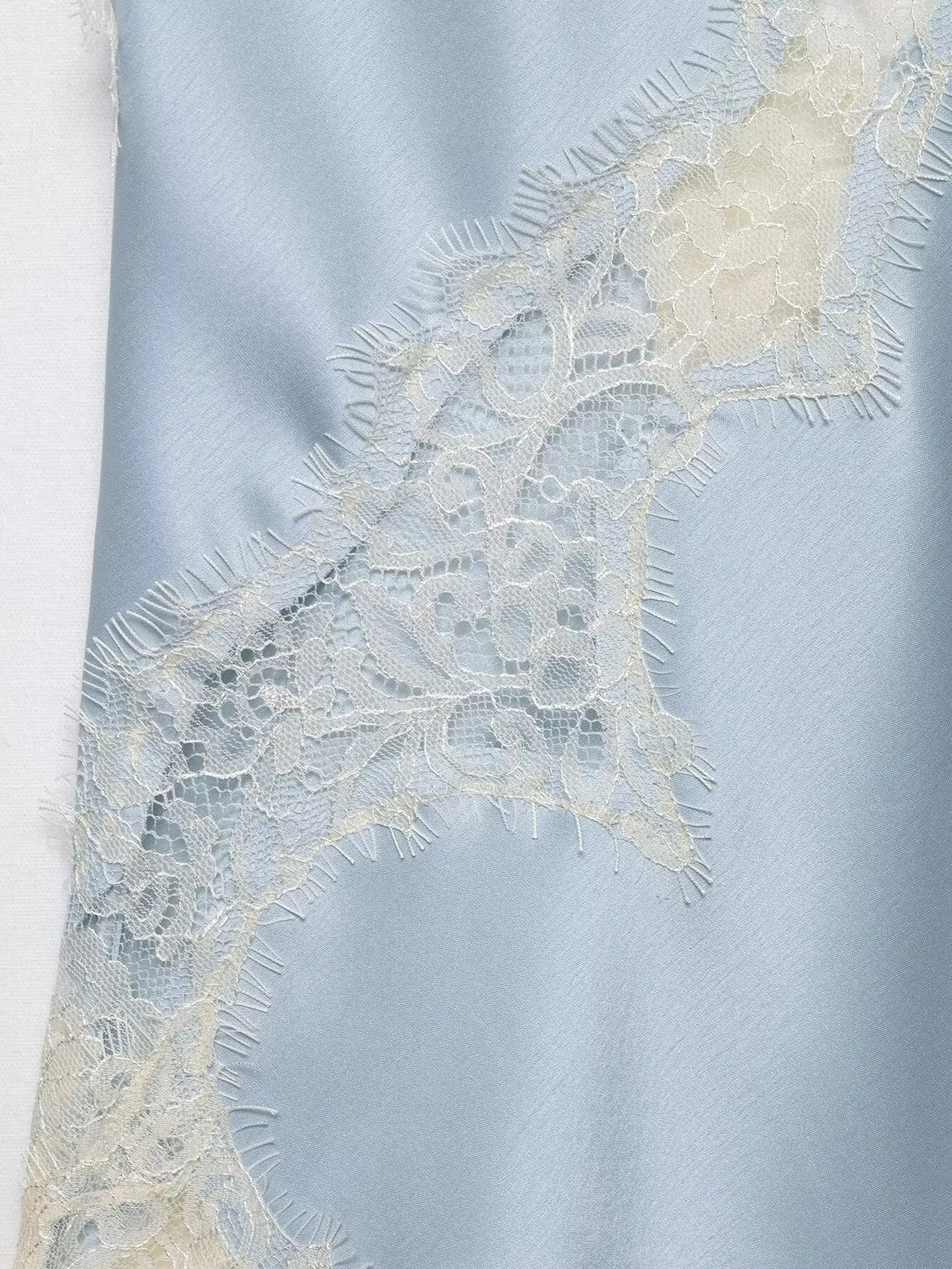 The Asymmetric Lace Camisole
