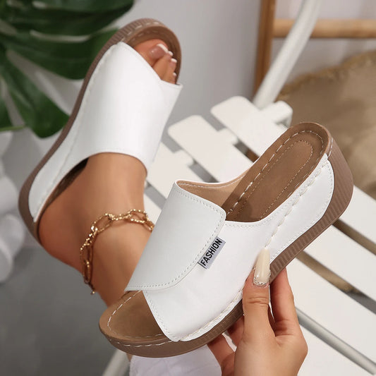 The Open Toe Wedge Slide