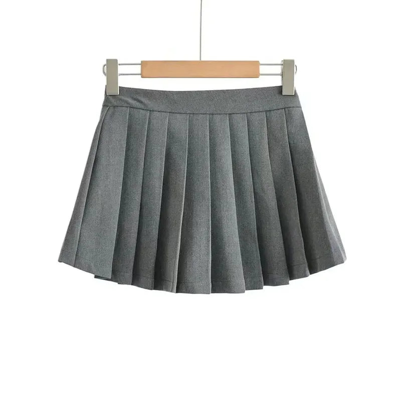 Spice girl pleated skirt female pure color small short skirt summer new Korean version JK college wind high waist mini skirt